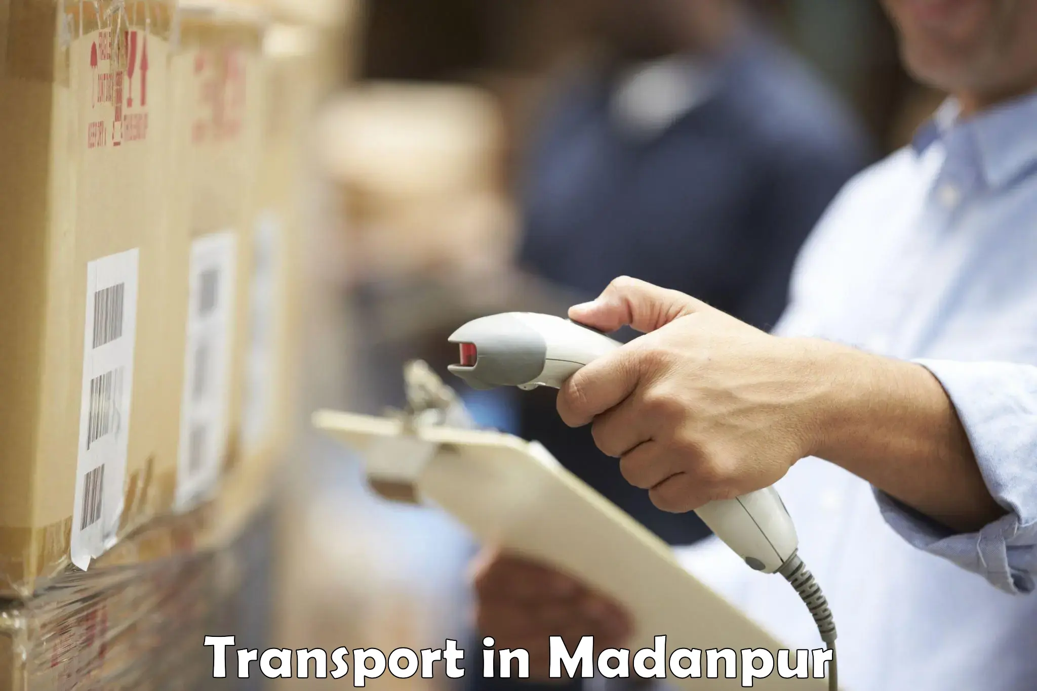 Online transport booking in Madanpur