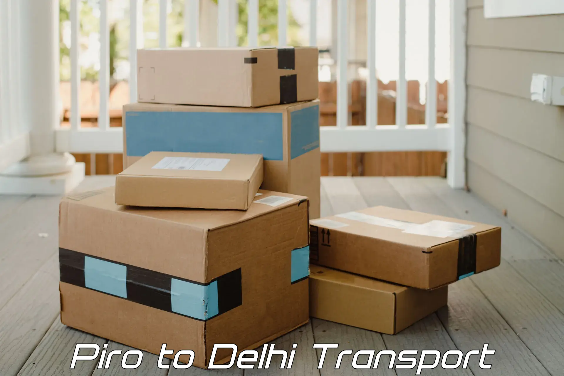 Two wheeler transport services Piro to Jamia Millia Islamia New Delhi
